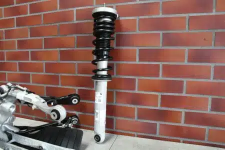 sospensione lato sinistro posteriore braccio oscillante semiasse ammortizzatore BMW M5 F90 6085km